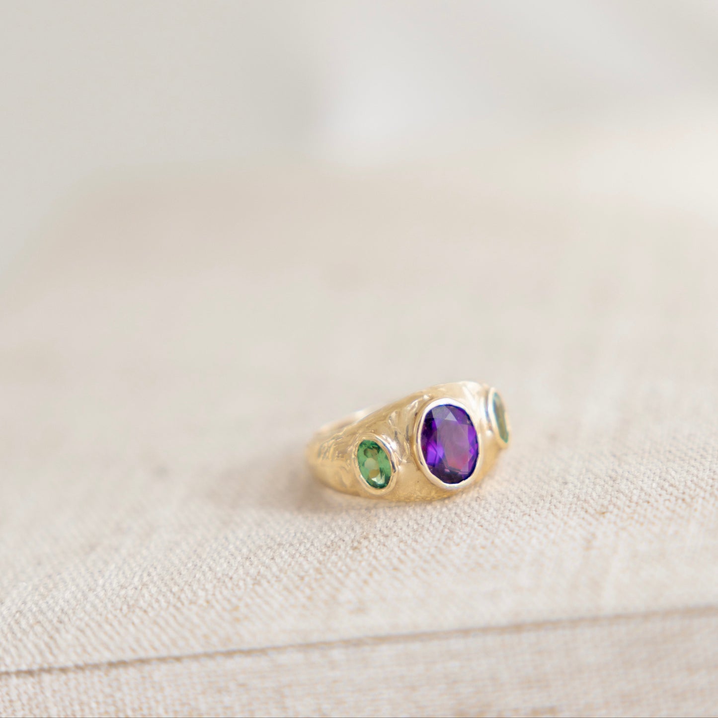 Amethyst and tsavorite garnets