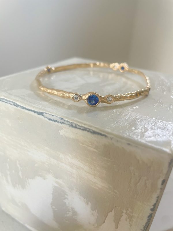 Custom sapphire + diamond bangle